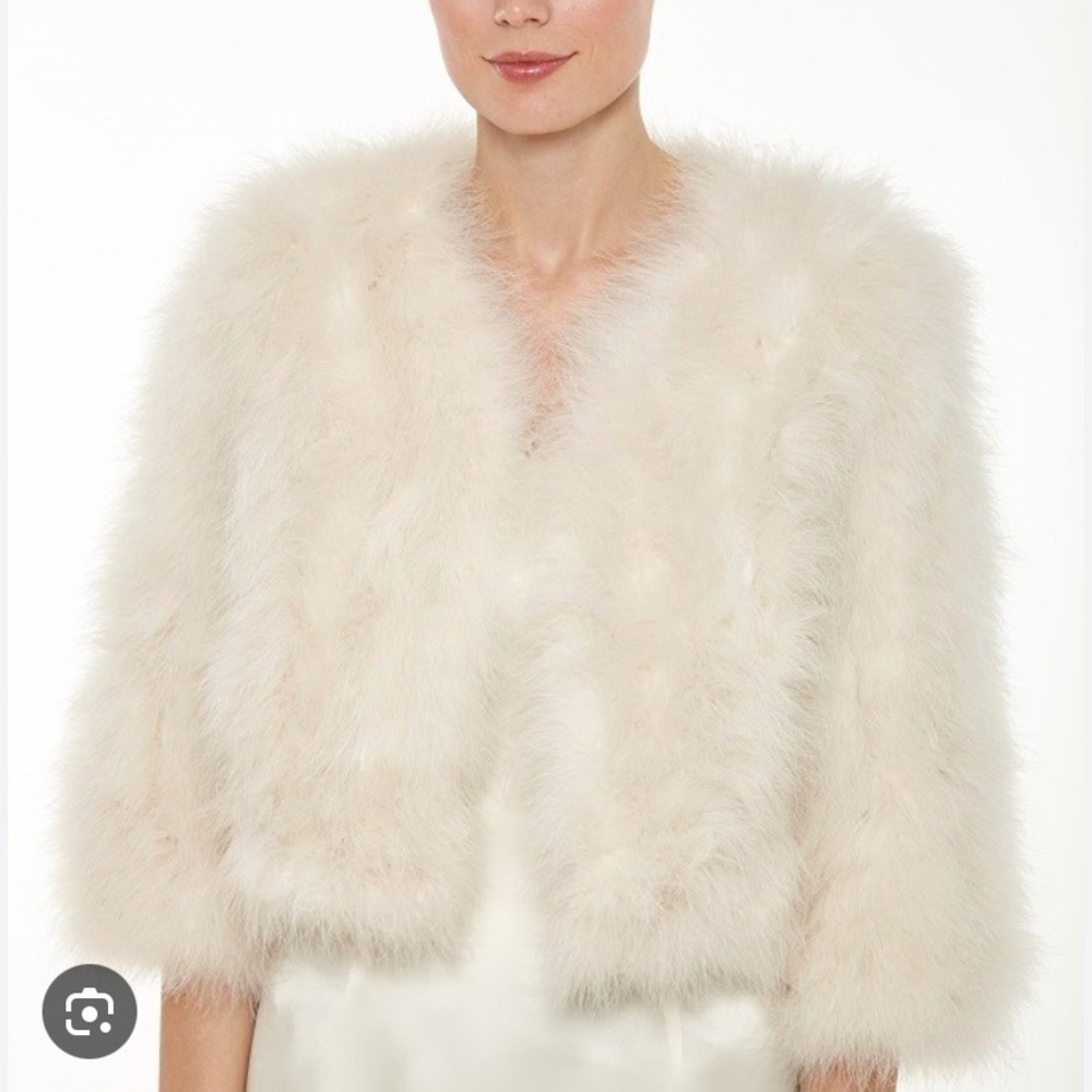 Linda Richardson white feather jacket